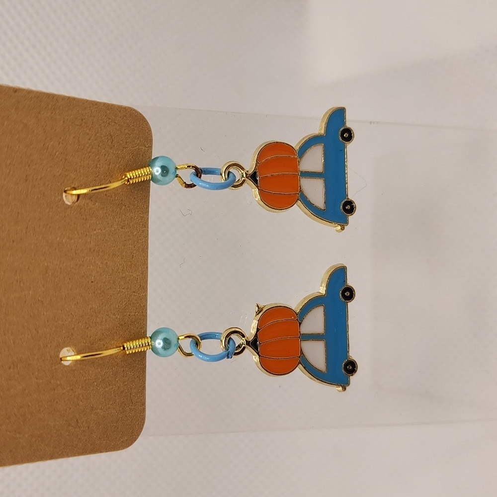 Car bringing pumpkin home Earrings